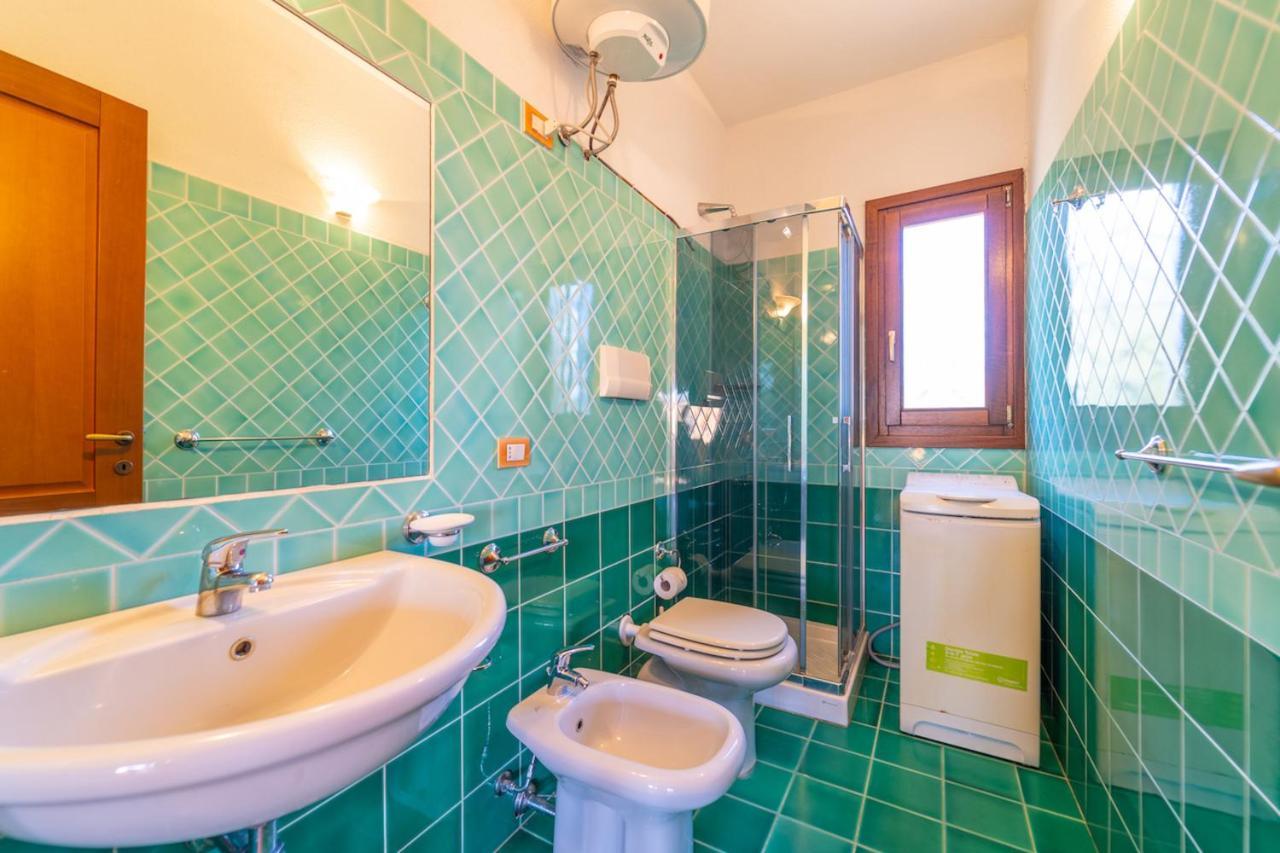 Aparthotel Il Faro San Teodoro Extérieur photo